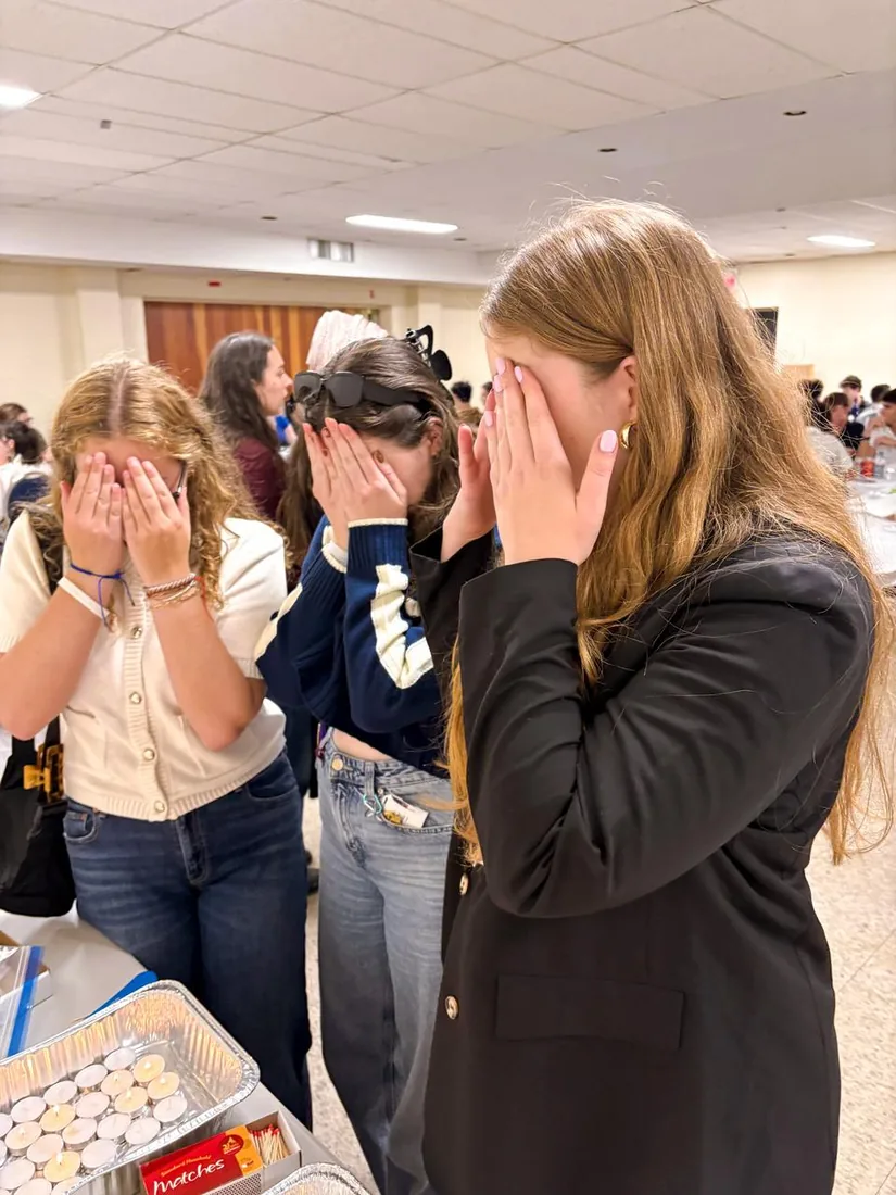 Students laughing together at a Hillel gathering