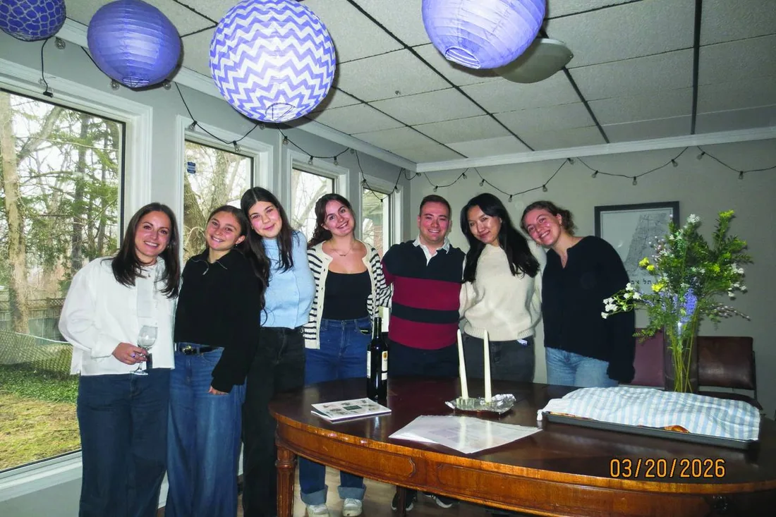 Students gathered around a table at Hillel Western's Shabbat Hosting Lab