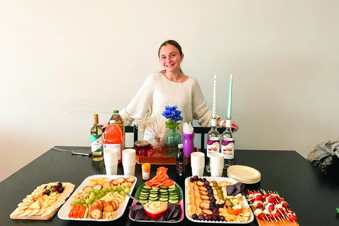 A student's Shabbat table spread with candles and food