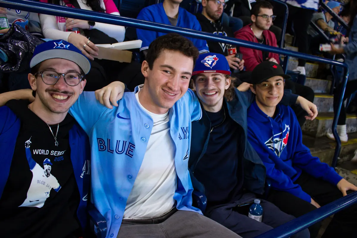 Students in Blue Jays gear at a Hillel night at the ballgame