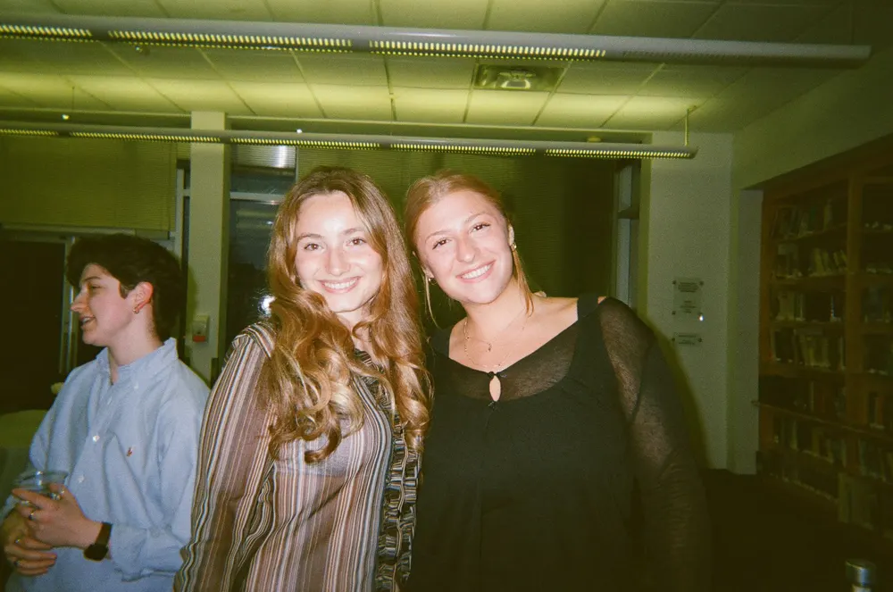 Alumni catching up at a Hillel networking night