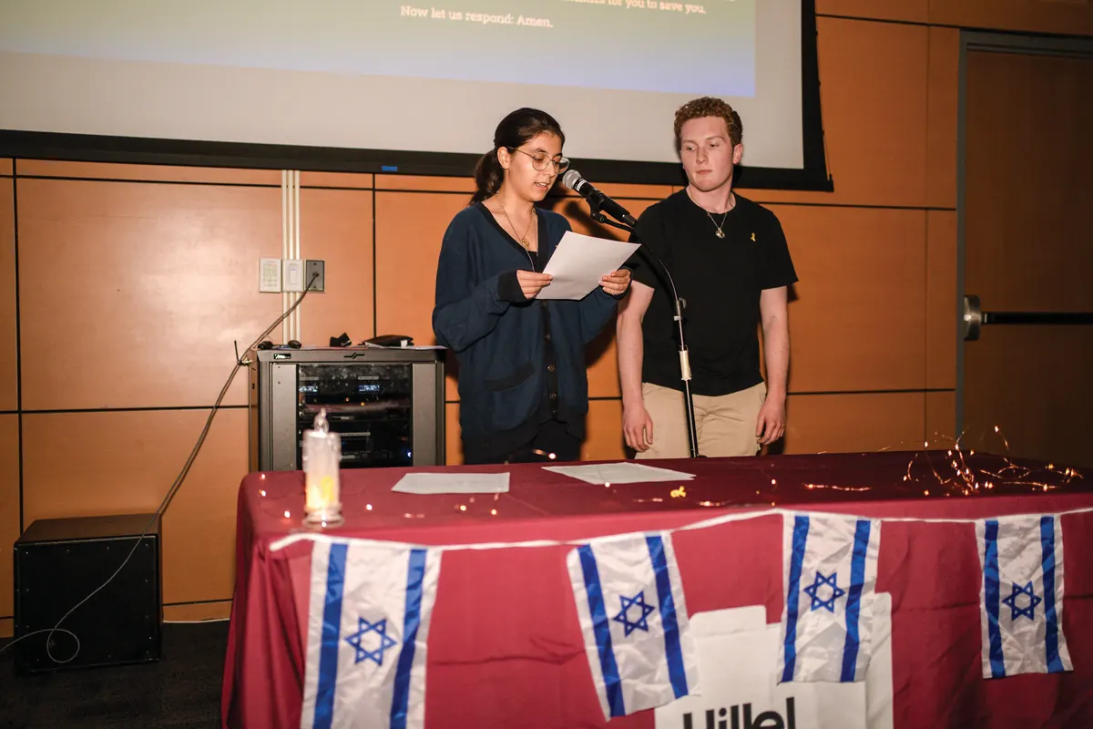 Two students speak at an Israel celebration event